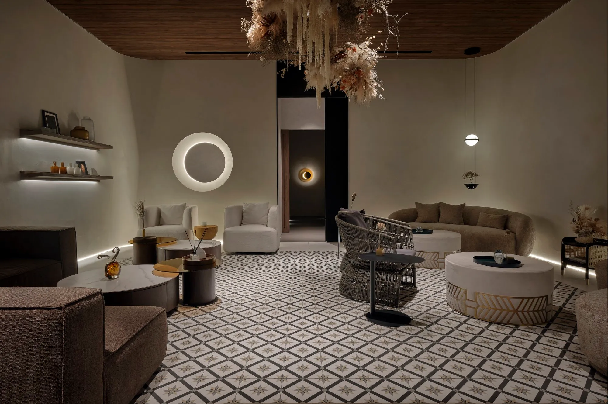 The lounge is designed as a calm social space before and after treatment.